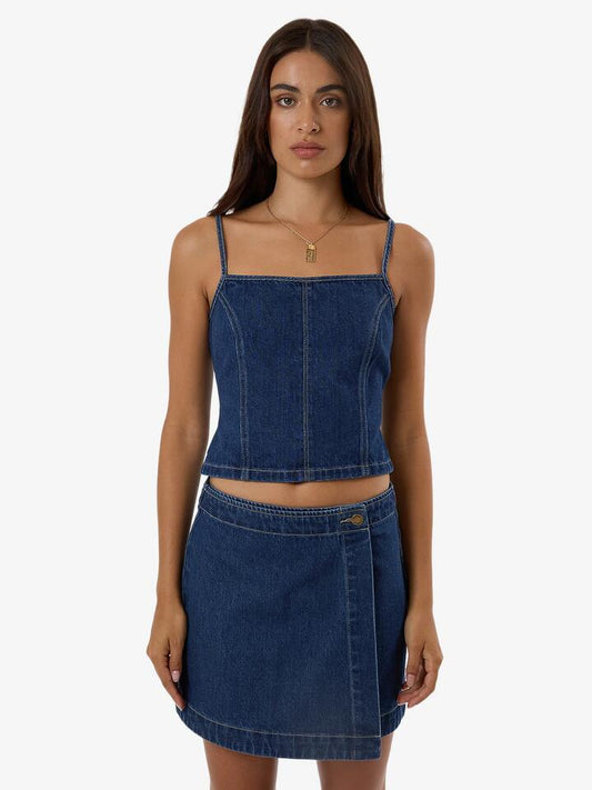 Image of a model wearing Tops. Product name - Thrills Womens Rory Denim Tank Top Union Blue in Union Blue colour by brand - Thrills