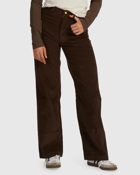 Image of a model wearing Pants. Productname: RVCA - Womens Underground Corduroy Pants - Coffee - in Coffee colour by brand - RVCA
