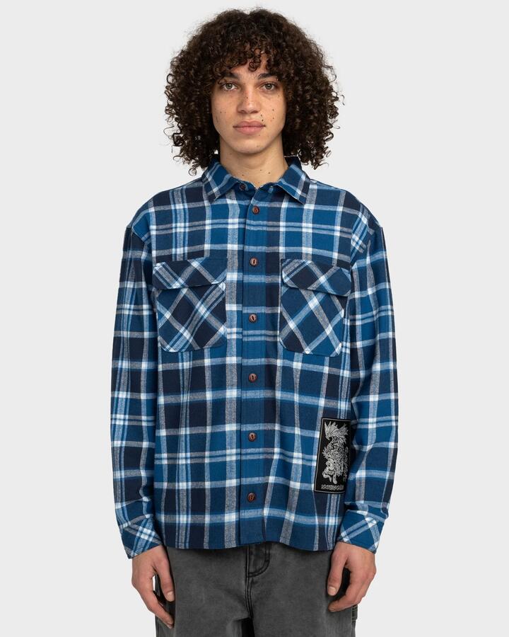 Image of a model wearing Tops. Product name - Element Mens Ffnc Checkmate Long Sleeve Shirt Fncc Bluebird Plaid in Fncc Bluebird Plaid colour by brand - Element