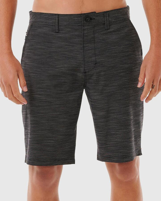 Image of a model wearing Shorts. Product name - Rip Curl Mens Jackson 20" Hybrid Short Black in Black colour by brand - Rip Curl