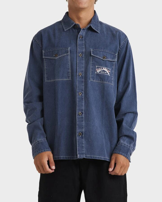 Image of a model wearing Tops. Productname: Billabong Mens Bong Years Over Long Sleeve Shirt Indigo - in Indigo colour by brand - Billabong