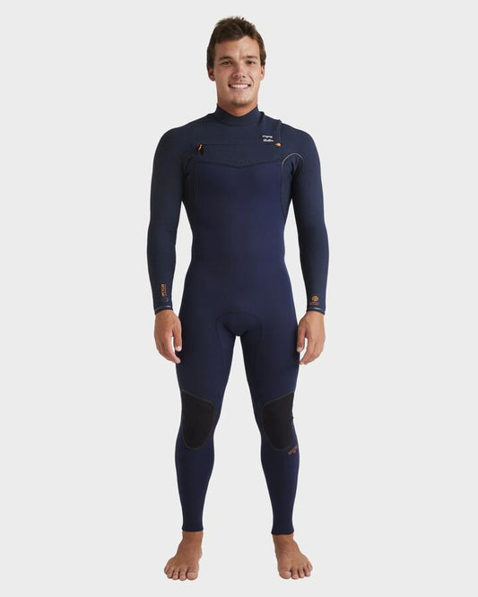 Image of a model wearing Tops. Productname: Billabong Mens 3/2Mm Furnace Natural Chest Zip Steamer Wetsuit Navy - in Navy colour by brand - Billabong