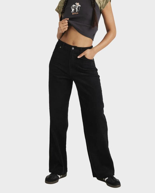 Image of a model wearing Pants. Productname: RVCA Womens Underground Cord Pant Black - in Black colour by brand - RVCA