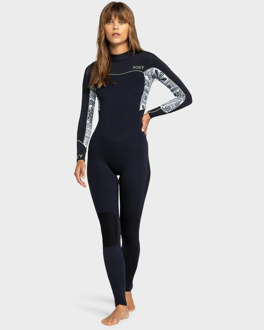 Image of a model wearing Tops. Productname: Roxy Womens 3/2 Swell Series Backzip Wetsuit Egret Mo Rockin Vibes - in Egret Mo Rockin Vibes colour by brand - Roxy
