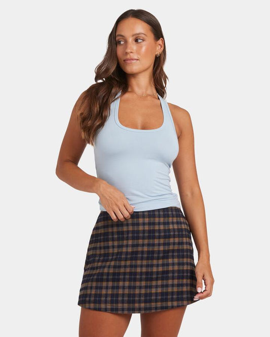 Image of a model wearing Tops. Productname: Nunui Womens Eclipse Halter Top Powder Blue - in Powder Blue colour by brand - Nunui