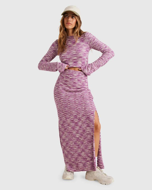 Image of a model wearing Skirts. Productname: Billabong Womens Hazy Sun Long Skirt Bright Orchid - in Bright Orchid colour by brand - Billabong