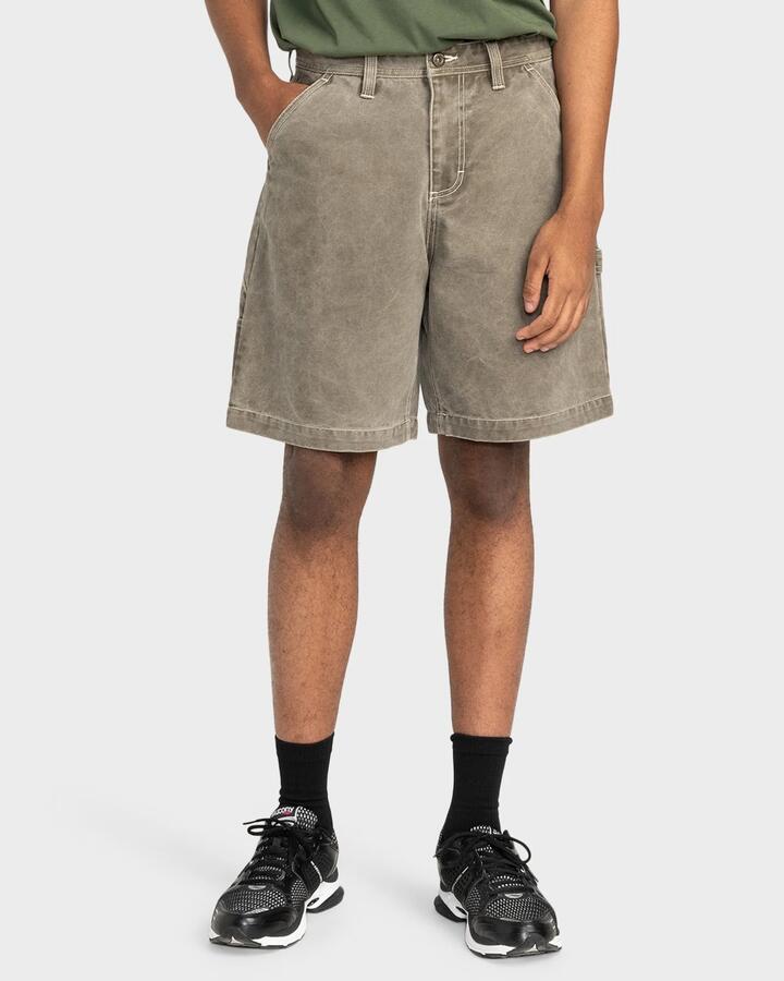 Image of a model wearing Shorts. Productname: Element - Mens Carpenter Canvas Cargo Shorts - Stone Gray - in Stone Gray colour by brand - Element