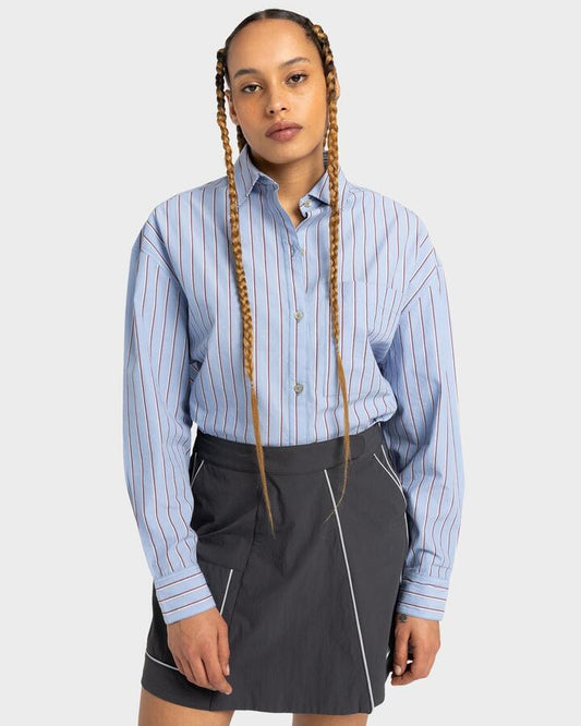 Image of a model wearing Tops. Productname: Element - Womens Aspan Long Sleeve Shirt - Stripe Blue/Pomegranate - in Stripe Blue/Pomegranate colour by brand - Element