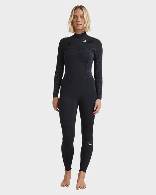 Image of a model wearing Tops. Productname: Billabong - Womens 3/2Mm Synergy Natural Chest Zip Steamer Wetsuit - Black Fade - in Black Fade colour by brand - Billabong