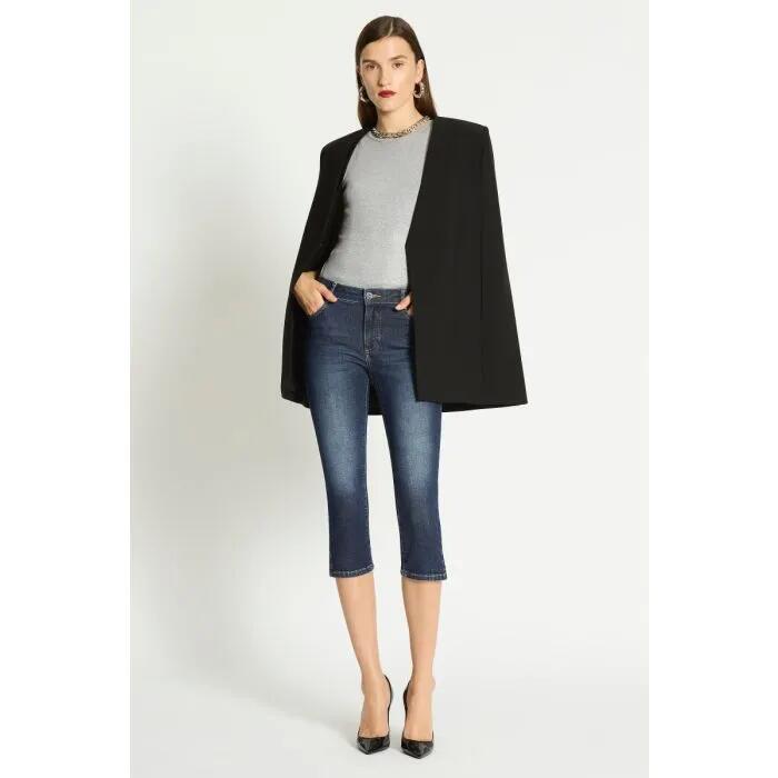 Image of a model wearing Denim. Productname: Maeve Pedal Pusher in Dark Indigo colour by brand - sass and bide