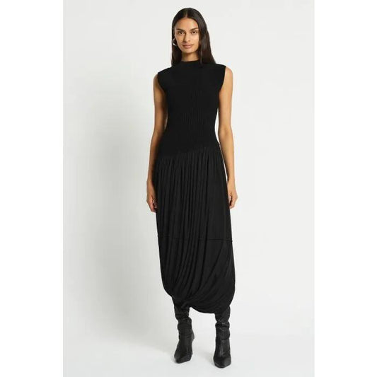 Image of a model wearing Dress. Productname: Apocalypse Knit Dress in Black colour by brand - sass and bide