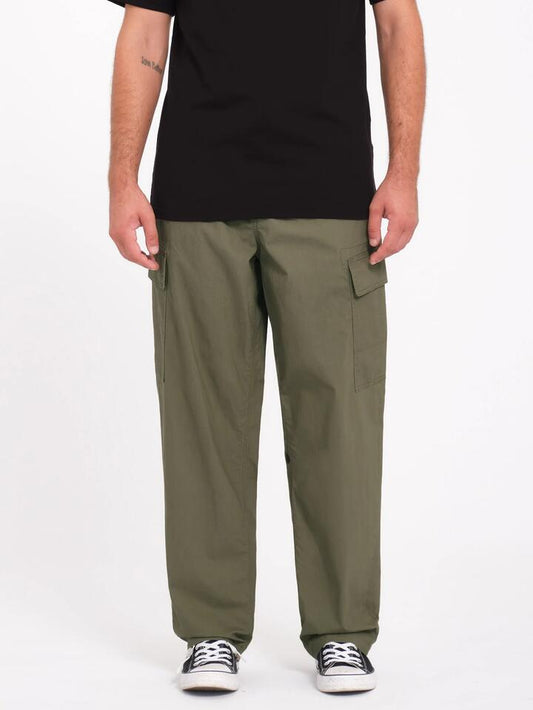 Image of a model wearing Pants. Productname: Volcom - Mens Billow Tapered Elastic Waist Cargo Pants - Wintermoss - in Wintermoss colour by brand - Volcom