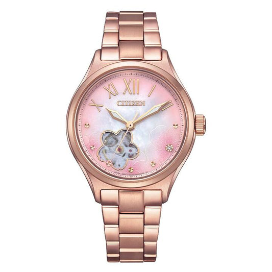 Image of a model wearing Dress. Productname: Citizen Women's Automatic Dress Watch PC1017-70Y in Watch colour by brand - Citizen
