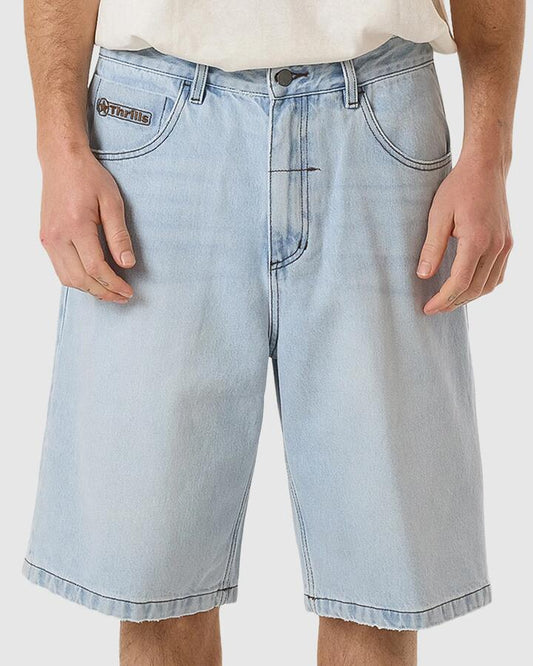 Image of a model wearing Shorts. Product name - Thrills Mens Gazed Big Slacker Denim Shorts Gazed Blue in Gazed Blue colour by brand - Thrills