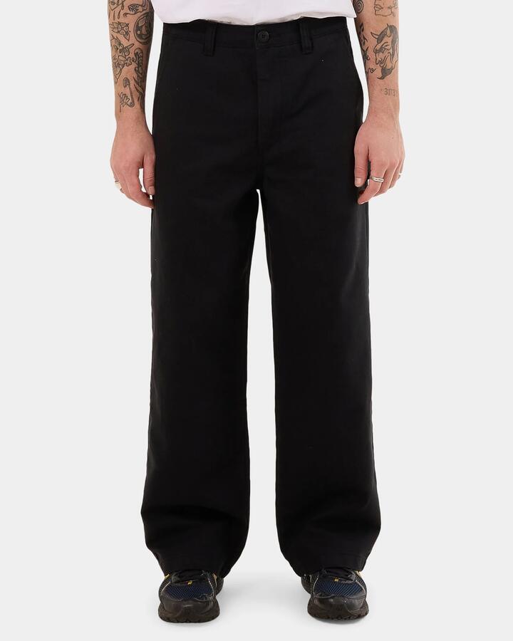 Image of a model wearing Pants. Productname: Worship - Mens Night Prowler Utility Carpenter Pants - Black - in Black colour by brand - Worship