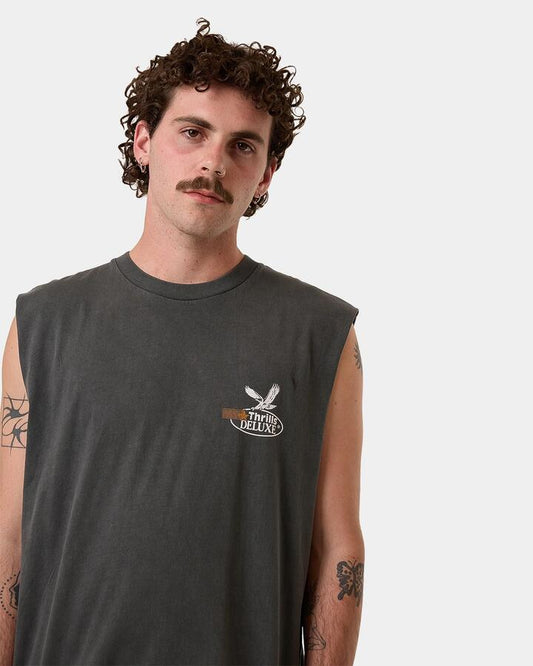 Image of a model wearing Tops. Product name - Thrills Mens Deluxe Merch Fit Muscle Shirt Merch Black in Merch Black colour by brand - Thrills