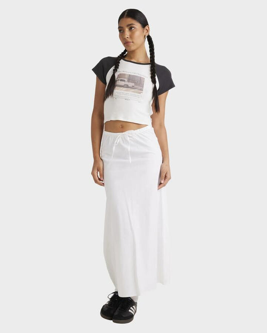 Image of a model wearing Skirts. Productname: RVCA - Womens April Tie Maxi Skirt - White - in White colour by brand - RVCA