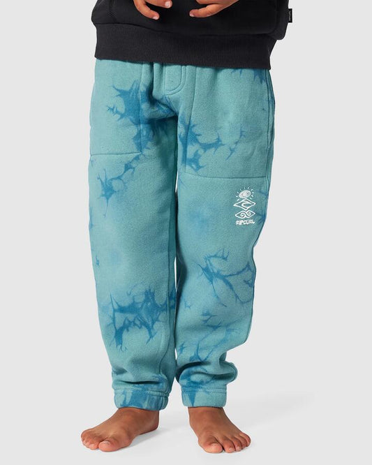Image of a model wearing Pants. Productname: Rip Curl Boys 8-16 Energy Track Pants Blue Lagoon - in Blue Lagoon colour by brand - Rip Curl