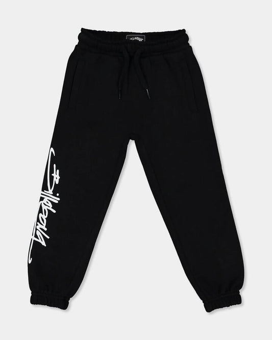 Image of a model wearing Pants. Product name - Billabong Boys 0-7 Logo Trackpants Black in Black colour by brand - Billabong
