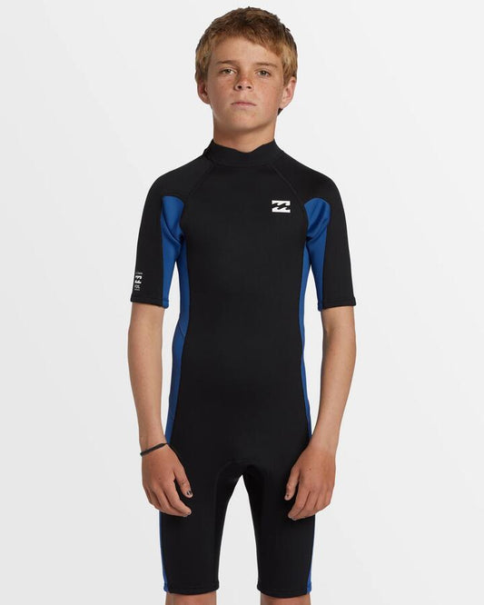 Image of a model wearing Tops. Productname: Billabong Boys 8-14 2/2 Foil Back Zip Springsuit Mid Blue - in Mid Blue colour by brand - Billabong