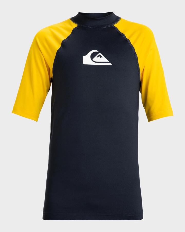 Image of a model wearing Tops. Productname: Quiksilver Boys 8-16 Everyday Short Sleeve Upf 50 Surf T-Shirt Dark Navy/Solar Power - in Dark Navy/Solar Power colour by brand - Quiksilver