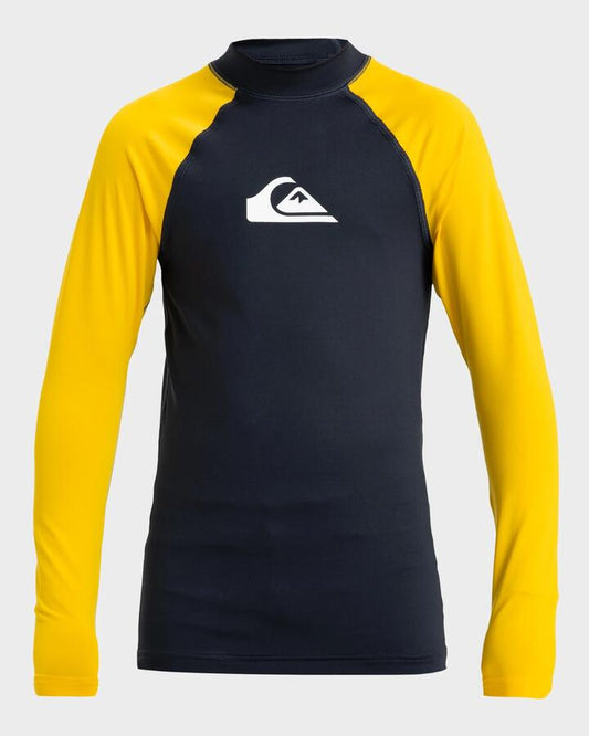 Image of a model wearing Tops. Productname: Quiksilver Boys 8-16 Everyday Long Sleeve Upf 50 Surf T-Shirt Dark Navy/Solar Power - in Dark Navy/Solar Power colour by brand - Quiksilver
