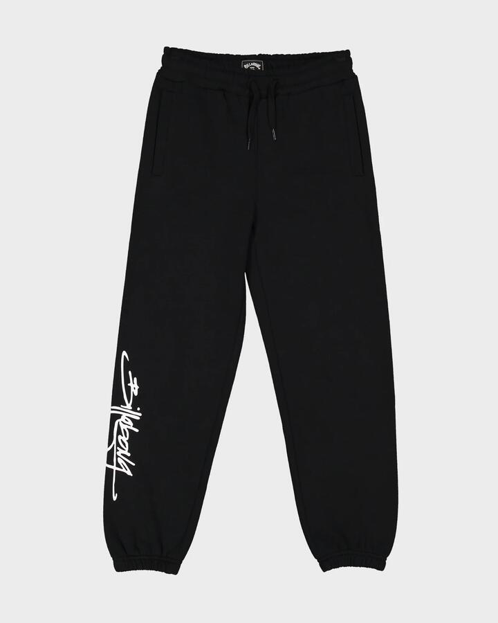 Image of a model wearing Pants. Product name - Billabong Boys 8-16 Trucker Track Pants Black in Black colour by brand - Billabong