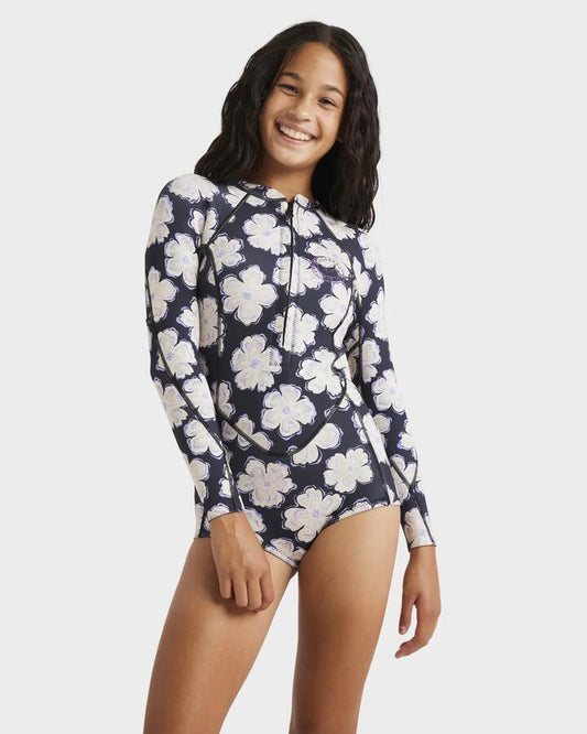Image of a model wearing Tops. Product name - Billabong Girls 8-14 Salty Dayz Natural Long Sleeve Springsuit Black Pebble in Black Pebble colour by brand - Billabong