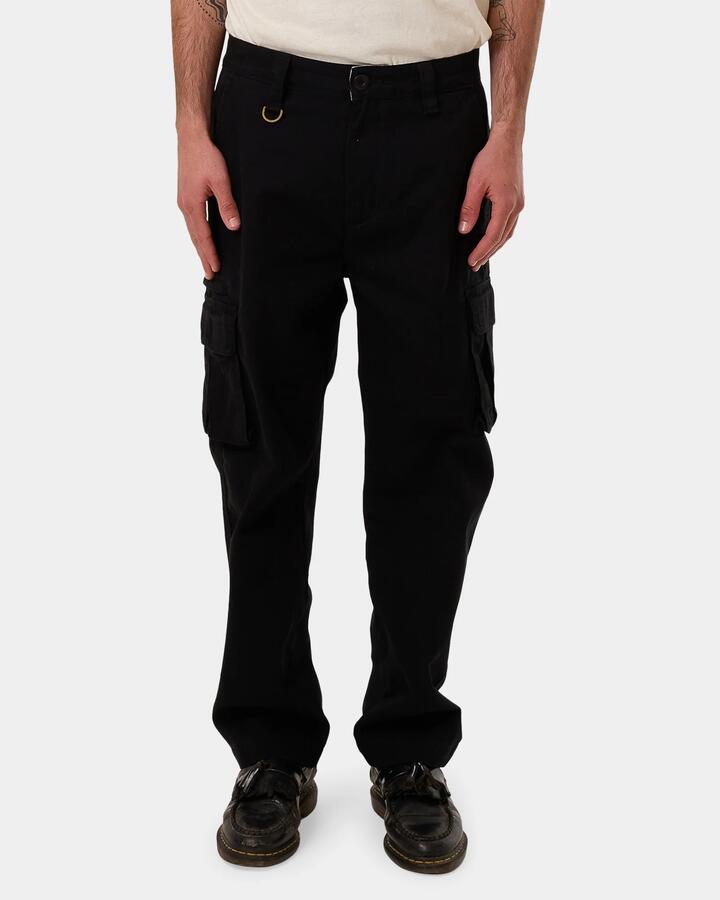 Image of a model wearing Pants. Productname: Thrills Mens Slacker Union Cargo Pants Black - in Black colour by brand - Thrills