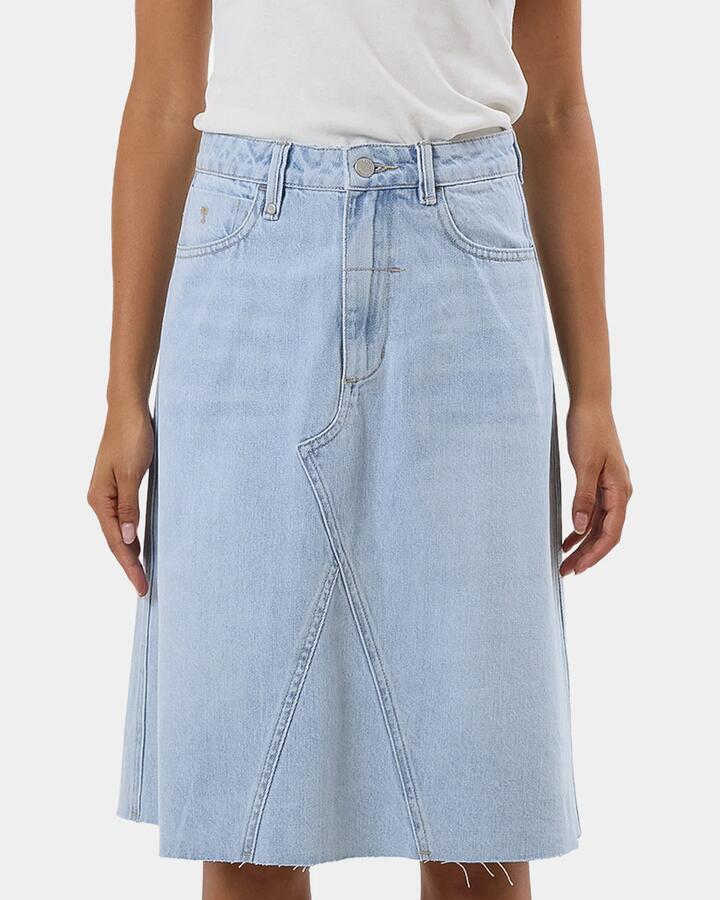 Image of a model wearing Skirts. Productname: Thrills Womens Cooper Denim Skirt Light Ash Blue - in Light Ash Blue colour by brand - Thrills