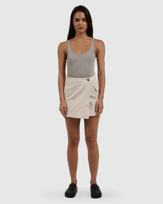 Image of a model wearing Skirts. Productname: Thrills Womens Peyton Wrap Cargo Mini Skirt Heritage White - in Heritage White colour by brand - Thrills