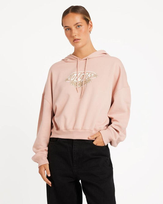 Image of a model wearing Outerwear. Productname: Volcom Womens Beach Bum Crop Pullover Hoodie Misty Rose - in Misty Rose colour by brand - Volcom