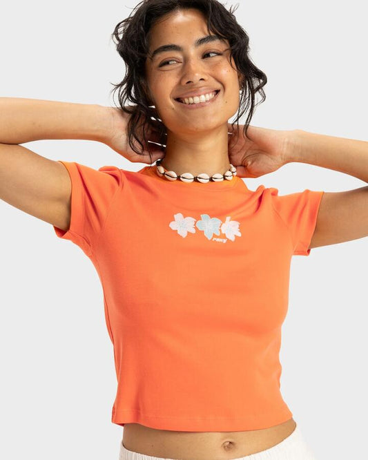 Image of a model wearing Tops. Productname: Roxy Womens Beach Love T-Shirt Nectarine - in Nectarine colour by brand - Roxy