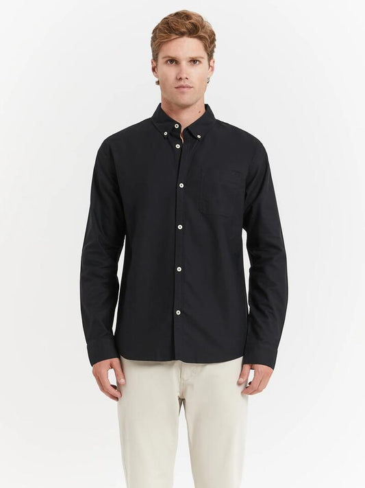 Image of a model wearing Tops. Productname: Article One Carson Shirt in Black colour by brand - Article One