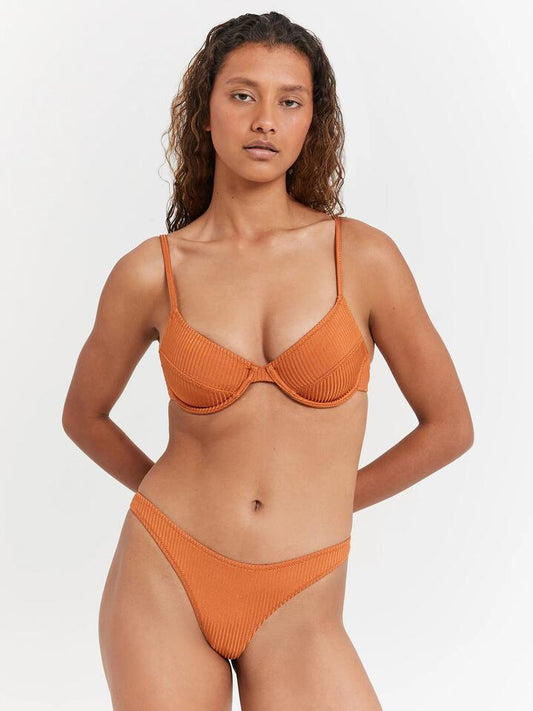 Image of a model wearing Tops. Productname: Beyond Her Classic Bralette in Copper colour by brand - Beyond Her
