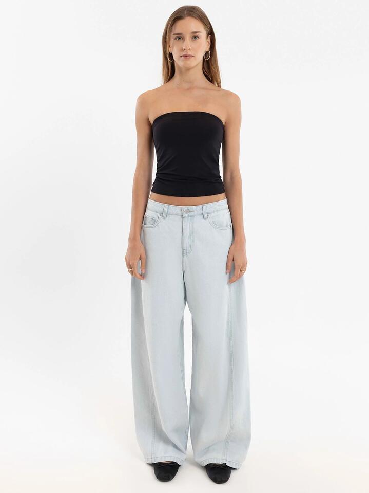 Image of a model wearing Pants. Productname: Beyond Her Breanna Wide Leg Jean in Ultra Bleach colour by brand - Beyond Her