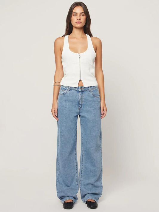 Image of a model wearing Denim. Productname: Abrand 95 Mid Baggy Gigi in Mid Blue colour by brand - Abrand