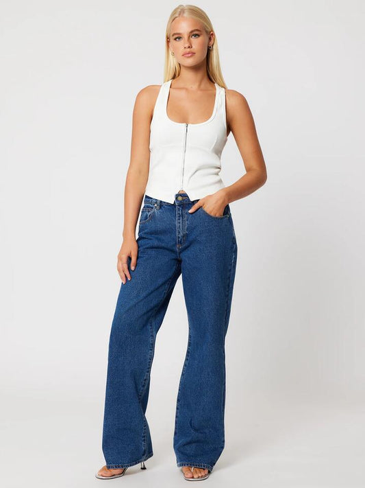 Image of a model wearing Denim. Productname: Abrand 95 Mid Baggy Bella in Mid Blue colour by brand - Abrand