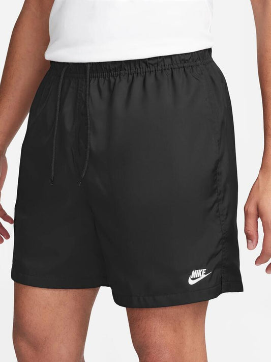 Image of a model wearing Shorts. Productname: Nike Club Woven Flow Shorts in Black/White colour by brand - Nike