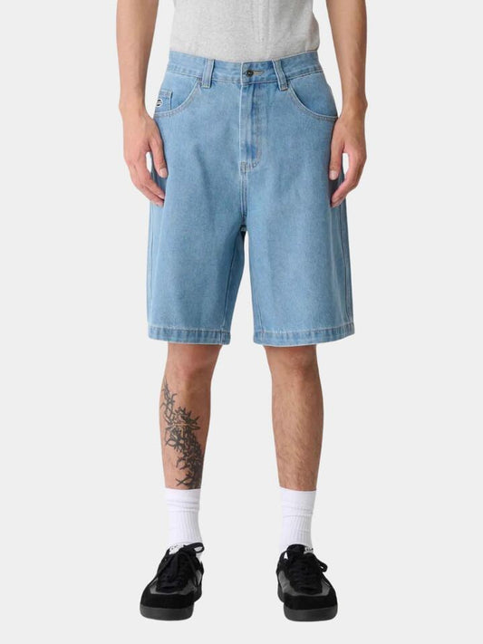 Image of a model wearing Denim. Productname: Xlarge Bull Denim 91 Shorts in Mid Blue colour by brand - Xlarge