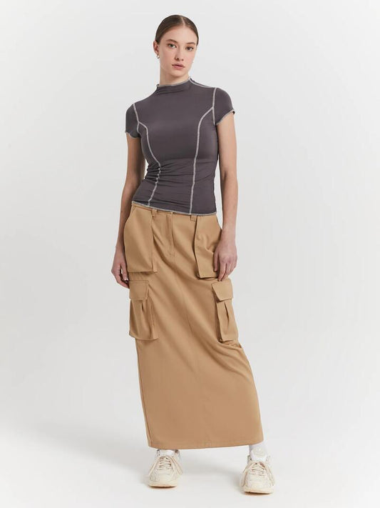 Image of a model wearing Skirts. Productname: Raef The Label Calle Utility Skirt in Parchment colour by brand - Raef The Label