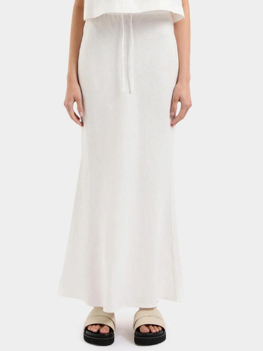 Image of a model wearing Skirts. Productname: Nude Lucy Amani Linen Skirt in White colour by brand - Nude Lucy