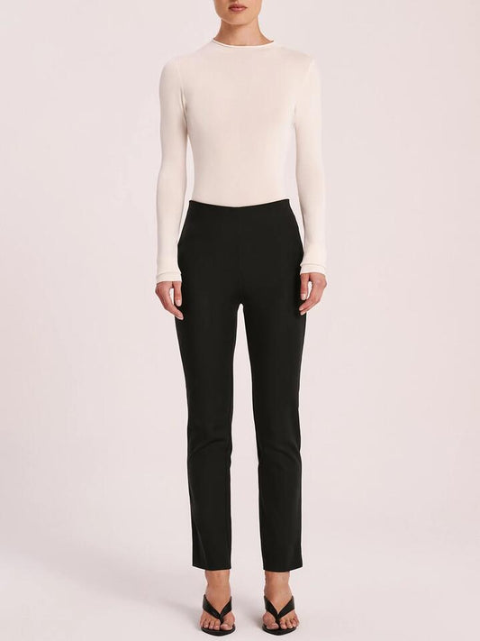 Image of a model wearing Pants. Productname: Nude Lucy Delyse Pant in Black colour by brand - Nude Lucy