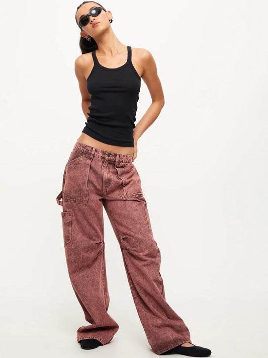 Image of a model wearing Denim. Productname: Lioness Miami Vice Low-Rise Baggy Jeans in Bronze Wash colour by brand - Lioness