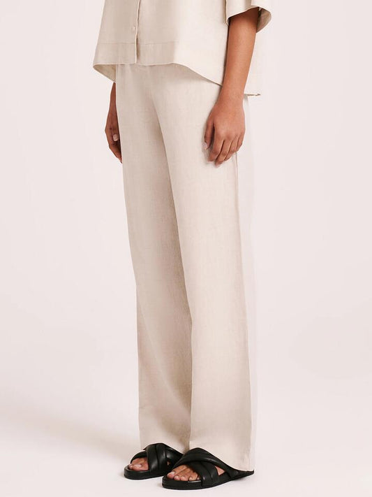 Image of a model wearing Pants. Productname: Nude Lucy Linen Lounge Pants in Natural colour by brand - Nude Lucy
