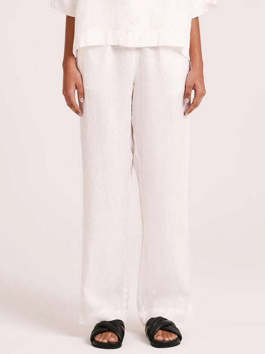 Image of a model wearing Pants. Productname: Nude Lucy Linen Lounge Pants in White colour by brand - Nude Lucy