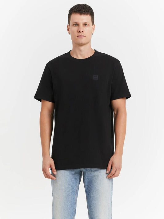 Image of a model wearing Tops. Productname: Neuw Neuw Premium T-Shirt in Jet Black colour by brand - Neuw