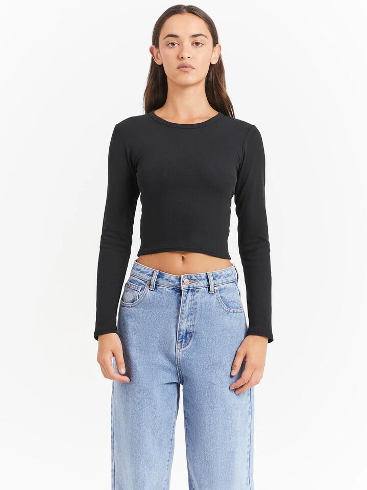 Image of a model wearing Tops. Productname: Beyond Her Georgie Long Sleeve Top in Black colour by brand - Beyond Her