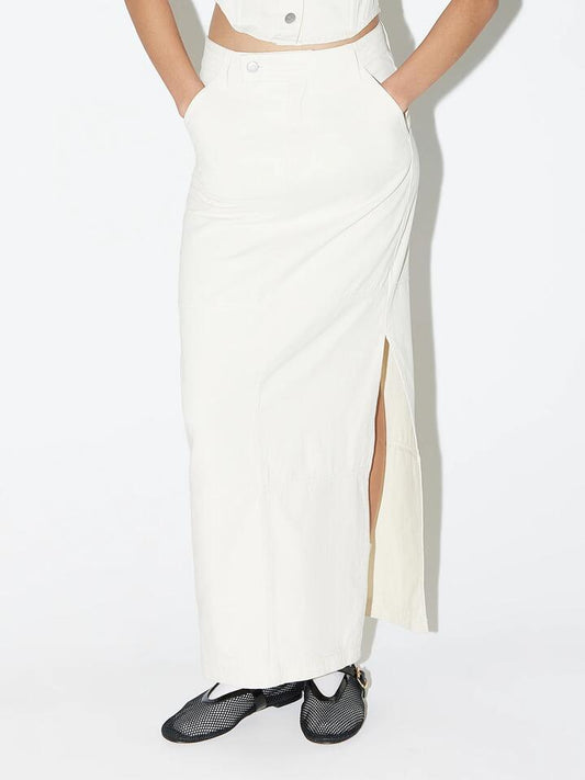 Image of a model wearing Skirts. Productname: Beyond Her Lenny Maxi Skirt in Cream colour by brand - Beyond Her