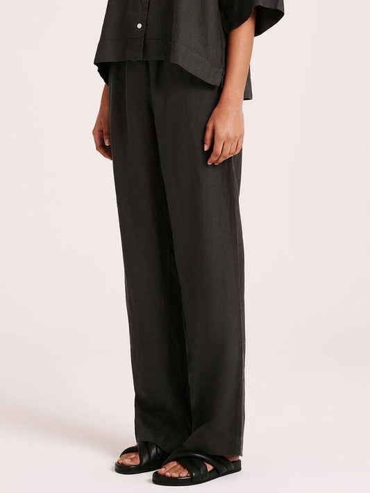 Image of a model wearing Pants. Productname: Nude Lucy Lounge Linen Pants in Coal colour by brand - Nude Lucy